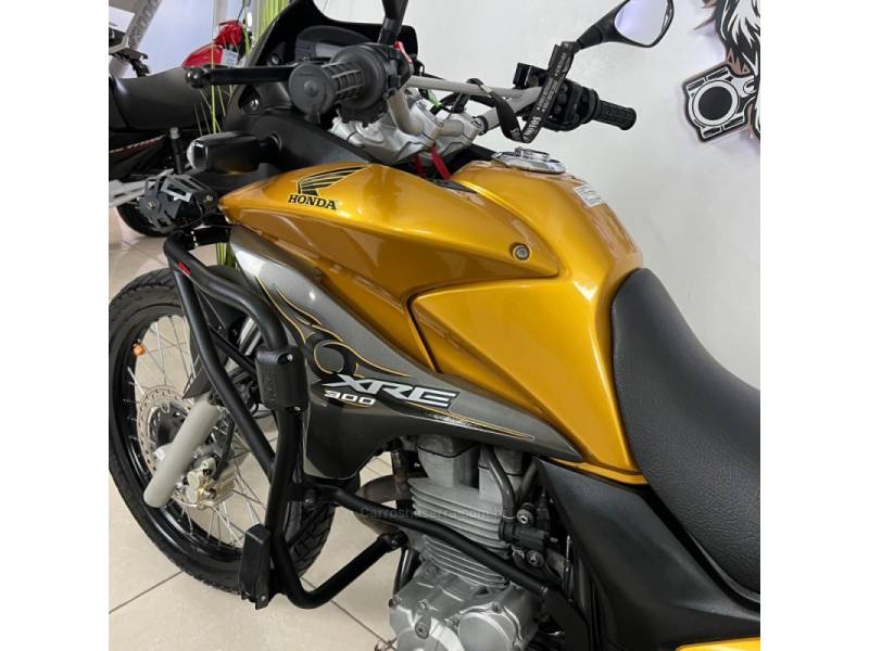 HONDA - XRE 300 - 2011/2011 - Amarela - R$ 18.900,00